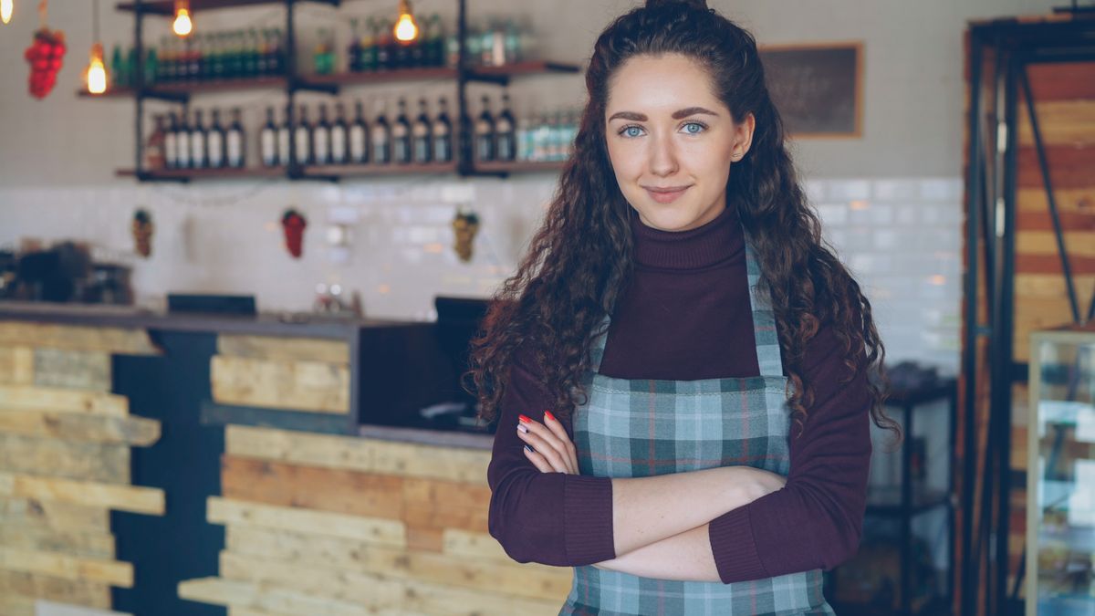 Restaurant owner standing at the counter